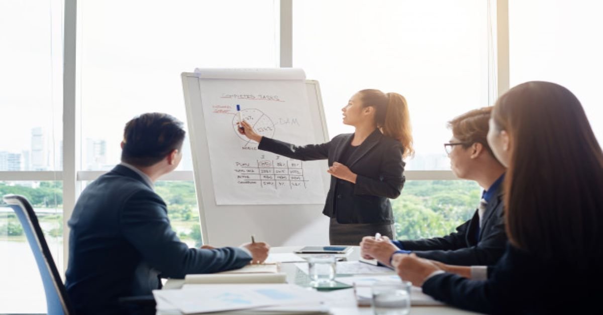 attractive-businesswoman-holding-meeting_1098-17754.jpg